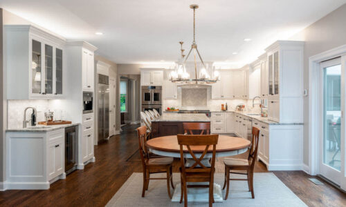 This is a picture of the dining room with cherry wood from a kitchen in Henderson Nevada. Its cabinetry is made custom by Kountry Kraft Cabinetry. 