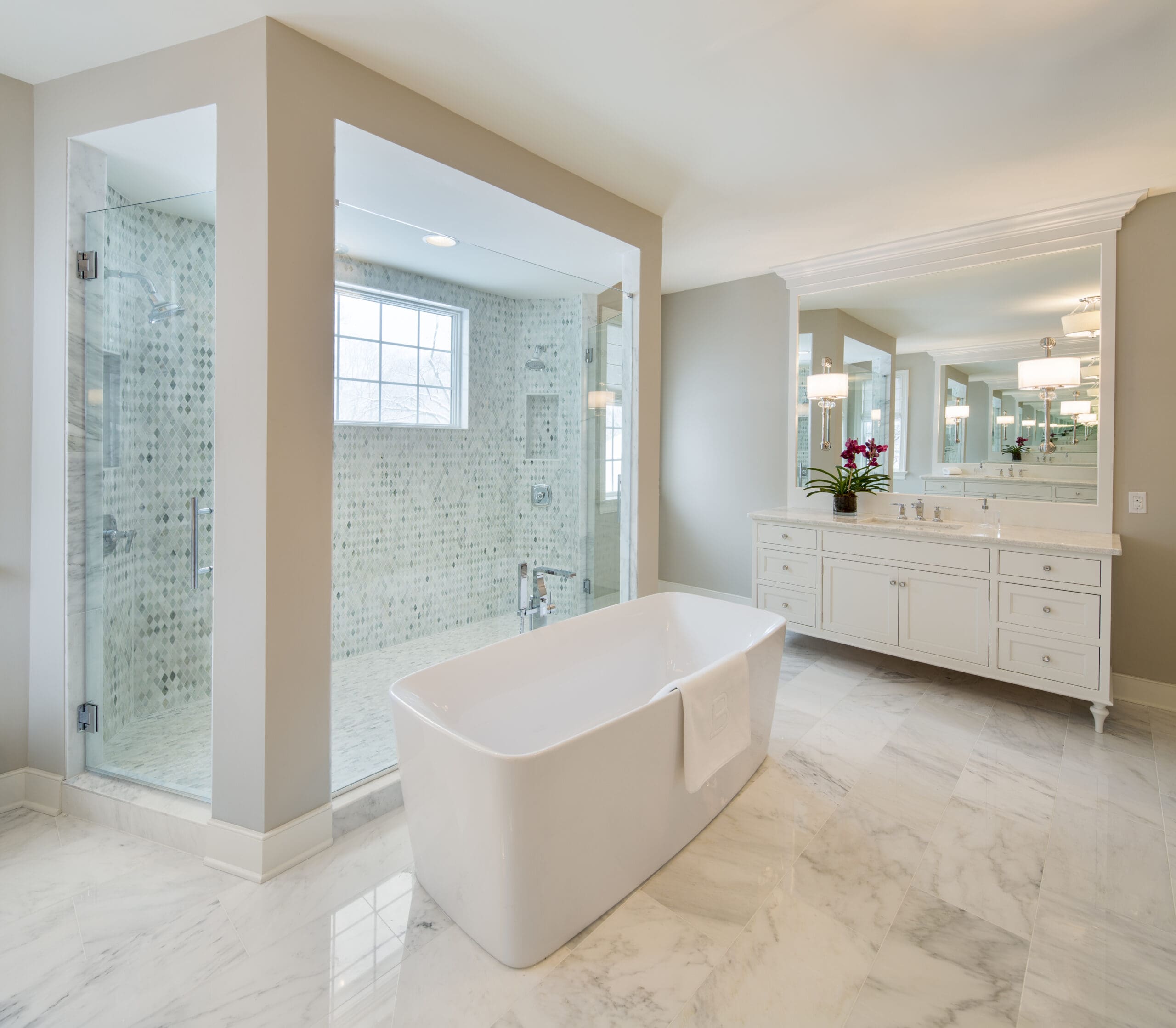 White bathroom vanity along with shower and tub Devon, PA