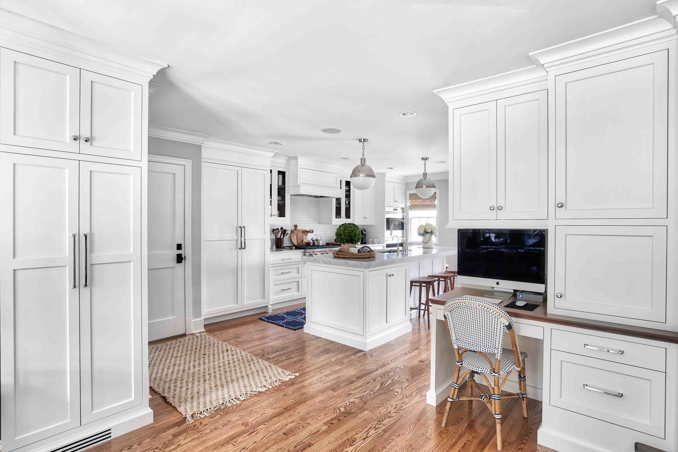 White Kitchen with a Built-In Kitchen Desk White Kitchen with a Built-In Kitchen Desk Area