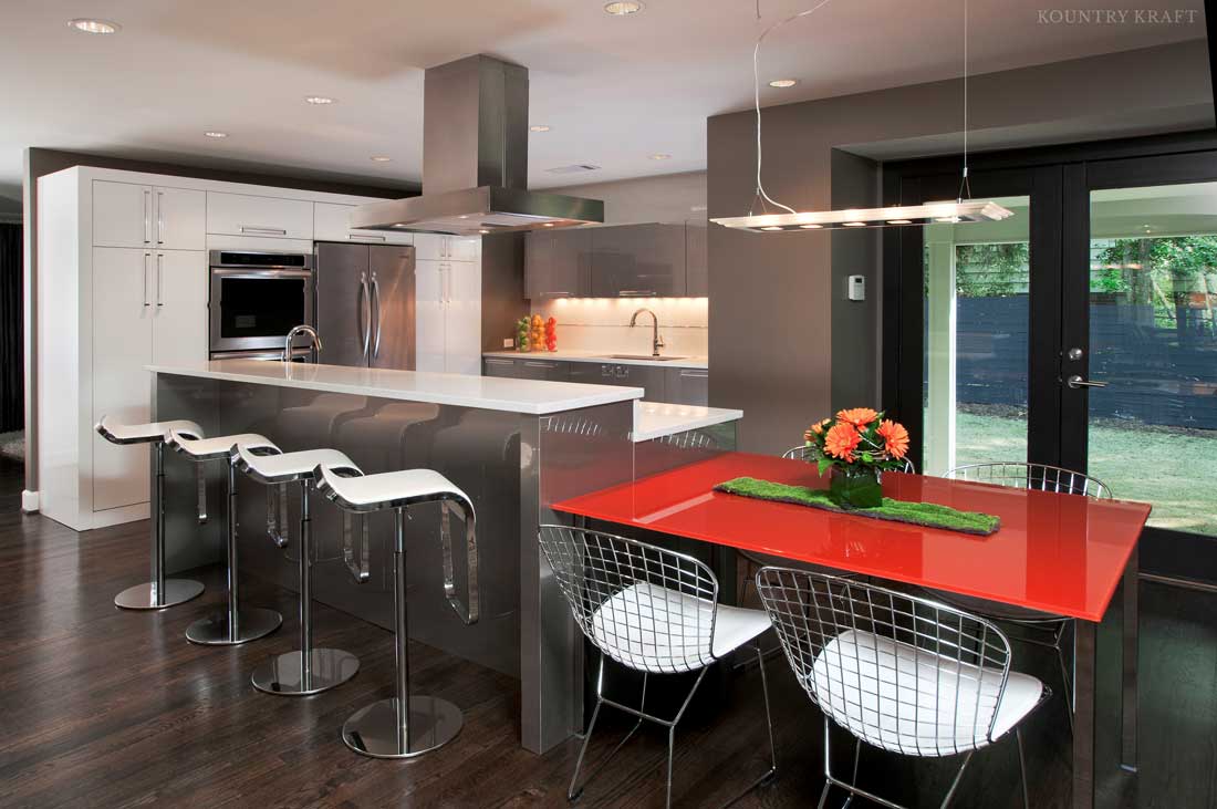 This Kitchen Features A Contemporary Kitchen Design This Contemporary Kitchen Design Style Features A Multilevel Island And Red Table With Seats
