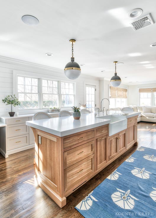 This Kitchen Features A Farmhouse Design Style Coventry Gray Kitchen Cabinets and Rift Cut White Oak Kitchen Island Features A Farmhouse Design Style