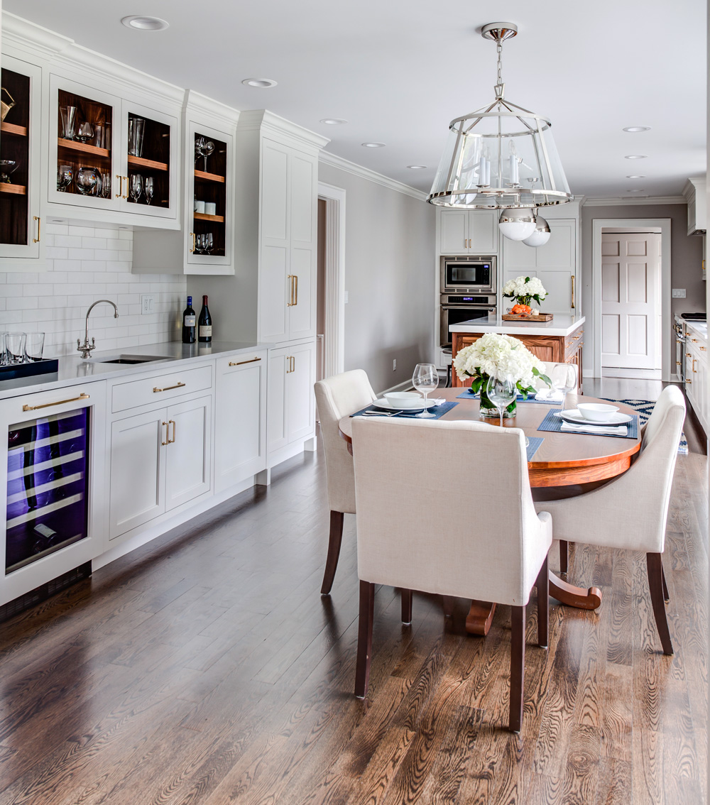 Wet Bar Dining Room Storage Cabinets Dining Room Storage Cabinets take the form of a wet bar with a wine fridge and prep sink
