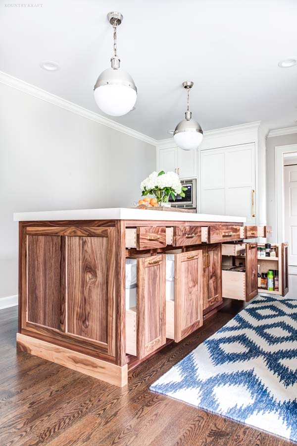 kitchen cabinet upgrades include built in storage to provide functionality in the kitchen