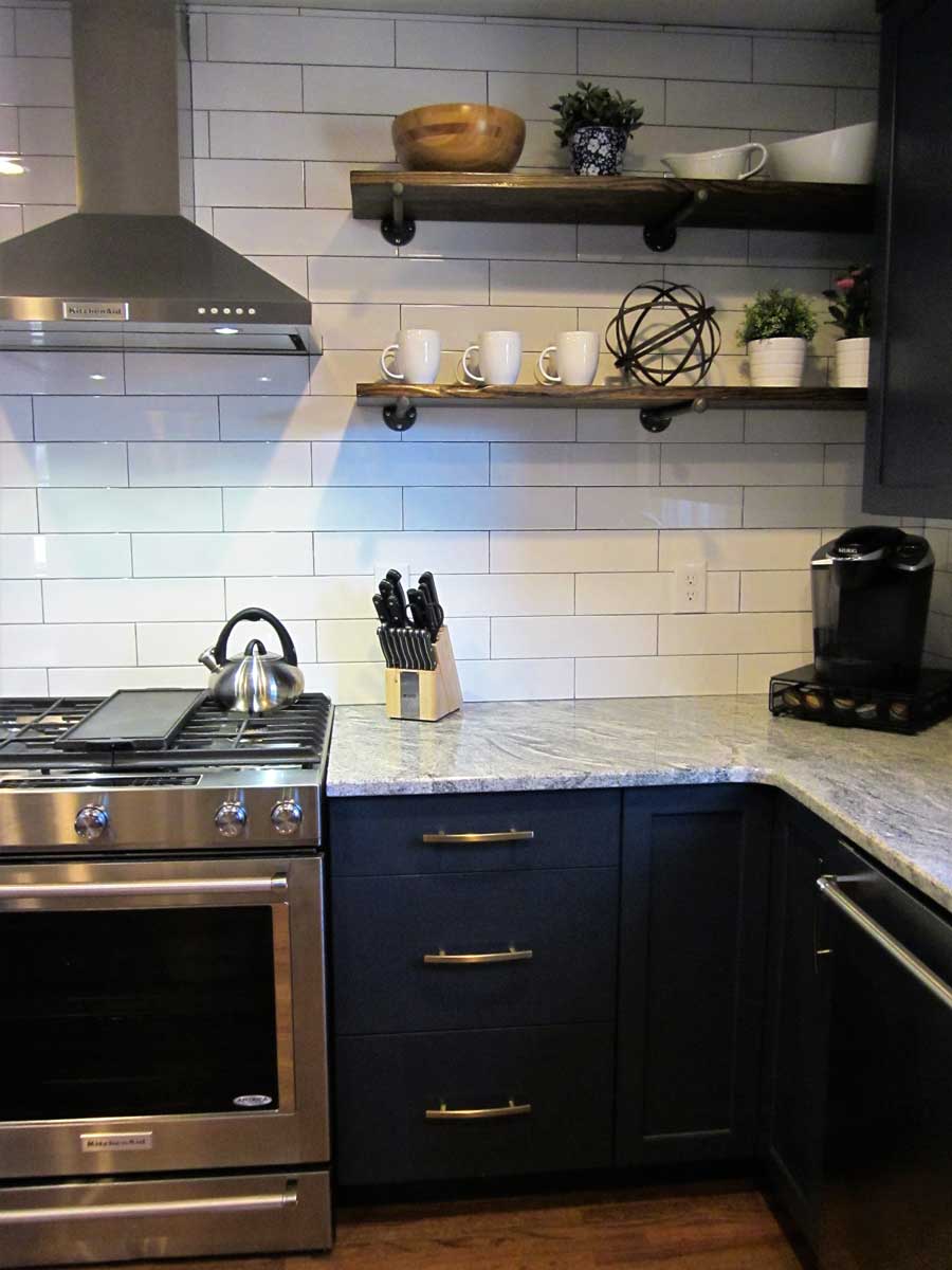 Kountry Kraft Cabinetry in a Design by Kitchen and Bath Designers of Pure Design Works