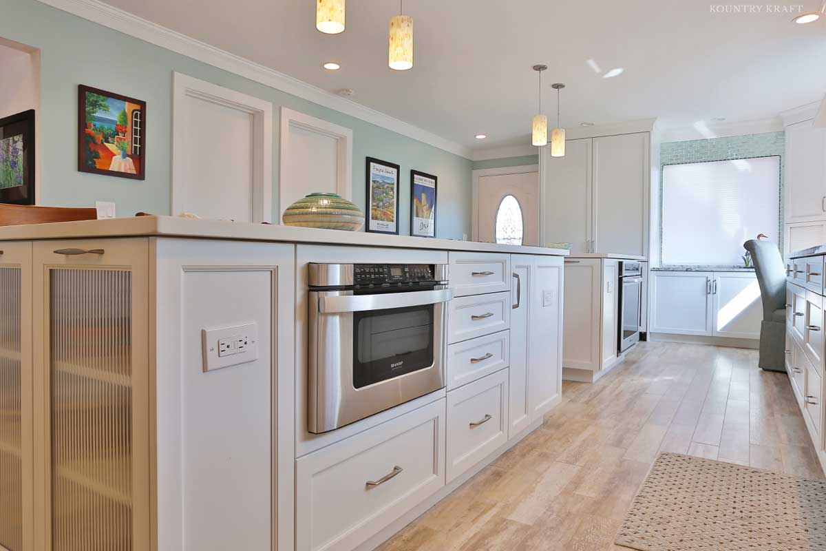 Transitional Kitchen with Electrical Outlets Incorporated into the Kitchen Island Designed for Easy Accessibility and More Prep Space for Appliances that Require Electricity Transitional Kitchen with Electrical Outlets Incorporated into the Kitchen Island Designed for Easy Accessibility for Appliances