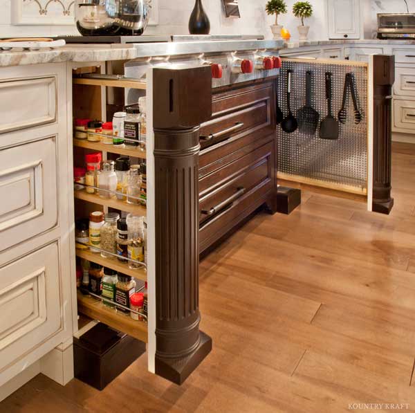 Pull-out storage in a brown kitchen cabinet.