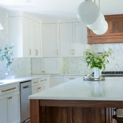 Elegant Island and Tall White Dove Cabinetry