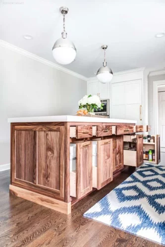 Kitchen island with open cabinets and deep drawers in Summit, New Jersey